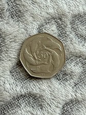 1997 Gibraltar 50P coin, Ring of Five Dolphins AA die mark.