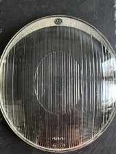 Hella headlamp lens for 1950s VW beetle asymmetrical, VW logo on top edge. RARE