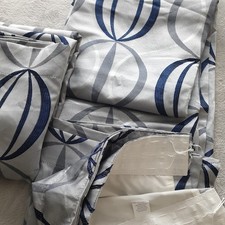 1 PAIR FULLY LINED POLYESTER PENCIL PLEAT CURTAINS, shades of blue.