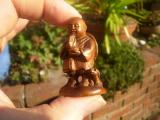 2b. Carved wood netsuke boy