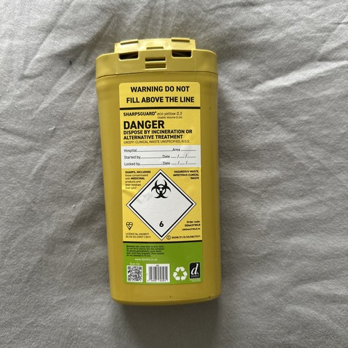 Yellow sharps insulin syringe - sharps,