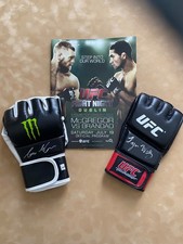 UFC bundle,official program and 2 gloves 1 signed.