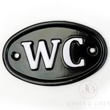 Toilet sign cast metal - wc,