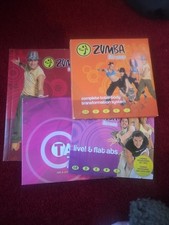 ZUMBA FITNESS LIVE! & FLAT ABS +COMPLETE BODY TRANSFORMATION SYSTEM 7 DVDs BOOK