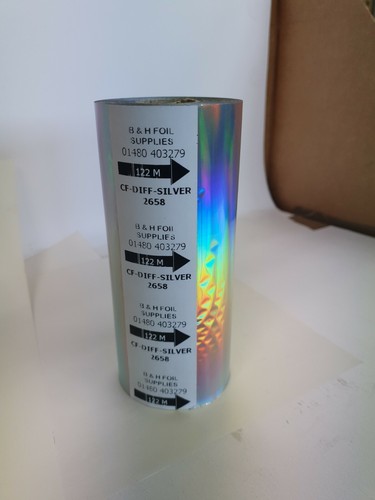 Silver holographic foil used - holographic,