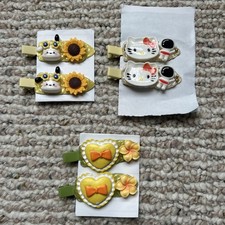 HAND MADE HAIR CLIPS. POPULAR