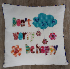 Embroidered cushions x 2 ‘love is all you need’ & ‘don’t worry be happy’