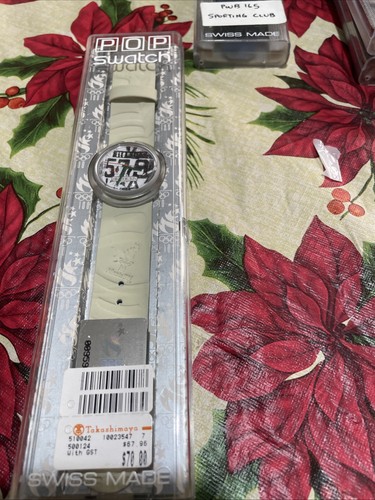 Another unworn cased - cased, with