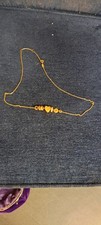 Gold Tone Fossil Charm Necklace 18 Inch Chain