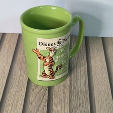 Tigger from Winnie the Pooh on a "Disney News" graphic In Green Mug