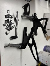 Yamaha R1/M Genuine Rear Sets. 2015-2025. Good Condition. OEM Carbon Heel Guards