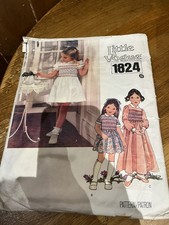 Little Vogue smocked dresses