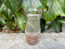 Antique Glass Milk Bottle, Wm. Herbison, Clougher Dairy, 16 cm tall.