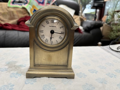 Heavy brass mantlepiece clock - heavy,