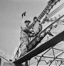 Labourer Overalls Stands A Gangplank Uses A Screwdriver Repair Lig- Old Photo