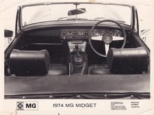 B.L. MG 1974 MG MIDGET INTERIOR FACIA & STEERING WHEEL, PERIOD PHOTOGRAPH.