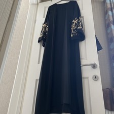 LADIES EMBROIDERED BLACK ABAYA.  LENGTH 54”. WILL FIT A SIZE 12.