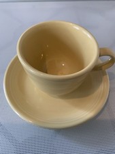 Homer Laughlin Fiesta Ware Coffee/Tea Cup & Saucer - Mellow Yellow  -   USA