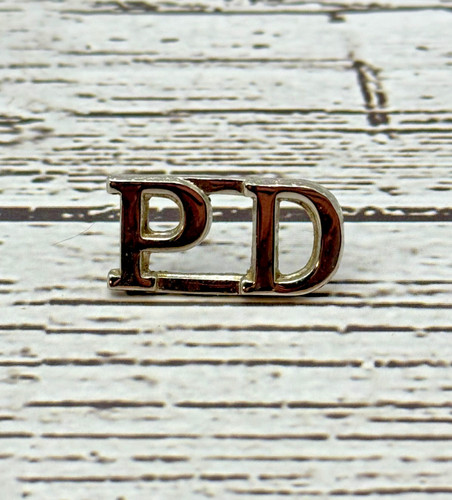 Silver tone collar insignia - tone,