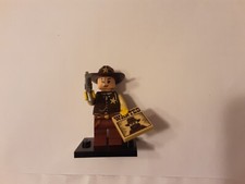 LEGO MINI FIGURE OF SHERIFF COMPLETE WITH STAND WANTED POSTER AND GUN.
