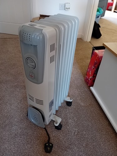 Oil filled electric heater - filled,