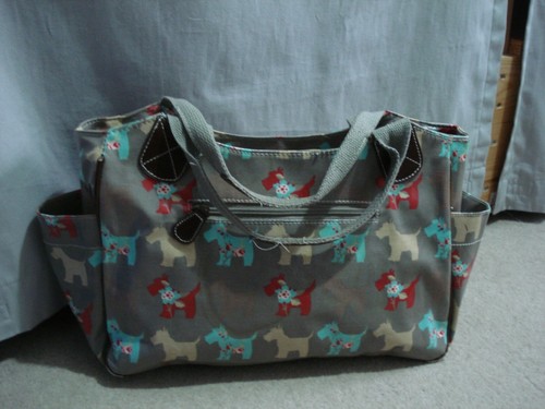 Taupe multi coloured dog - &,