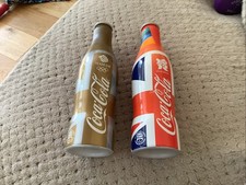 Two 2012 Metal Coco Cola Bottles Limited Edition