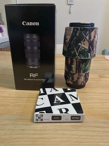 Canon 100 400mm lens hood - canon,