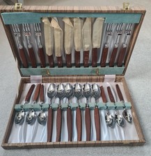 VINTAGE SWEDISH CANTEEN OF CUTLERY WITH ROSEWOOD HANDLES.  C. 1970