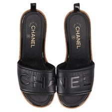 Chanel Logo Embossed Lambskin