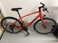 TREK FX 2 GEN 4 9-spd hybrid bike. LAVA RED. Size L. 2025. Nearly new ~50 miles.
