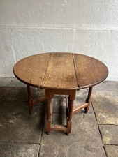 An Antique Folding Round Drop
