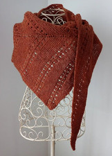 Hand knitted asymmetrical