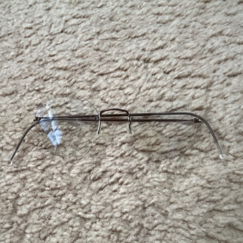 Rimless gently used lindberg - gently,