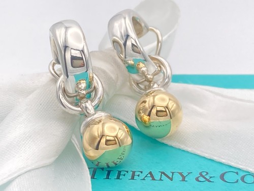 Tiffany gold ball dangle - &,