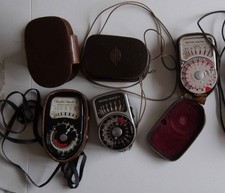 Three Sangamo Weston exposure meters