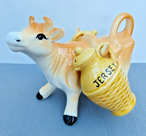 Vintage jersey cow carrying - cow,