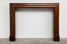 Reclaimed early 20th century Art Deco mahogany bolection fireplace circa 1920.