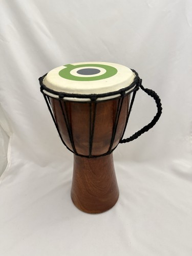 Hand carved wooden djembe drum - hand,