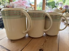 Vintage set of three graduated jugs by Pountney & Co. Ltd
