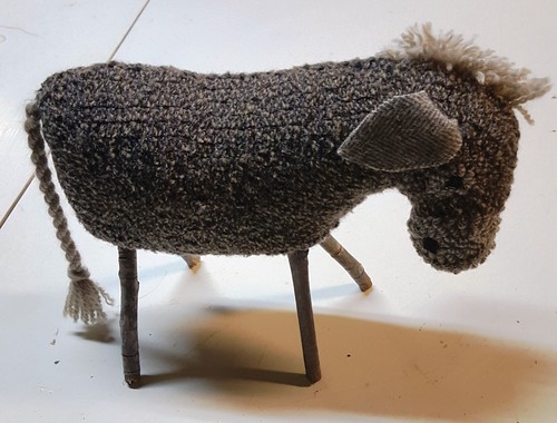 Donkey rug hooking - rug, paper
