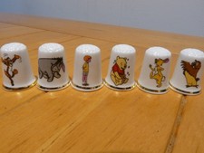 6 Winnie the pooh thimbles