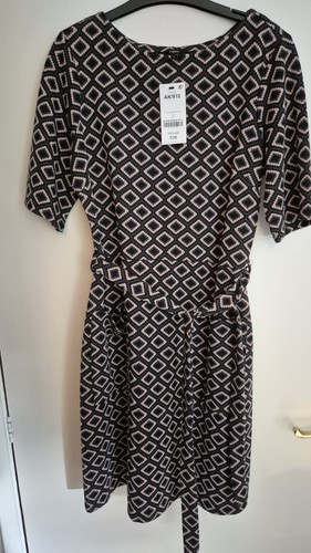 Next black pink geometric - &,