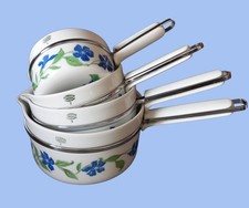 SERIES OF 4 PORCELAIN POTS