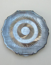 VINTAGE ROUND POWDER COMPACT by STRATTON, MAINLY SILVER COLOUR.