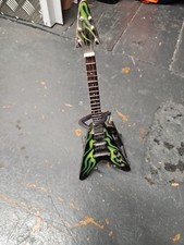 miniature replica of James Hetfield's "Green Hotrod" Flying V guitar