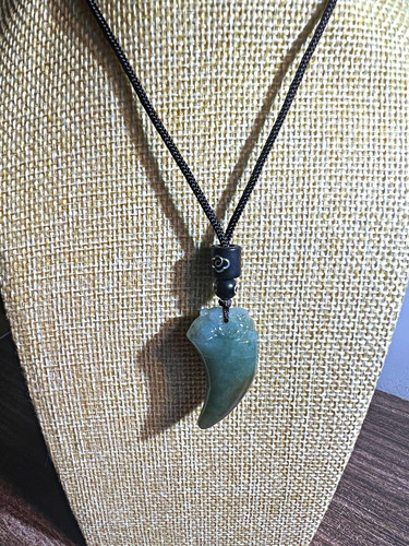 Natural jade wolf tooth