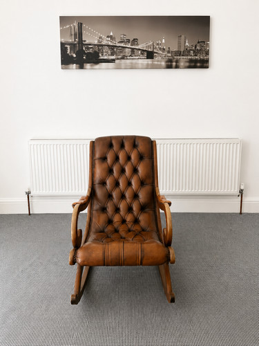 Tan leather chesterfield
