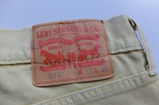 Vintage Levi’s 511 yellow needle cords W32 L34 Slim fit Modern denim *stain