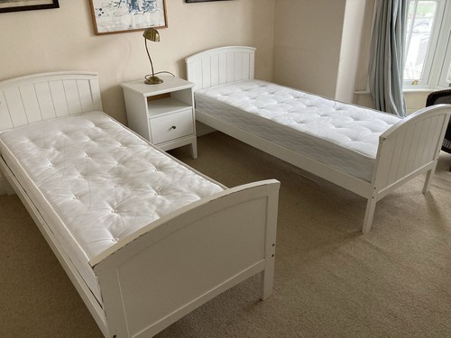Small single white beds - single,